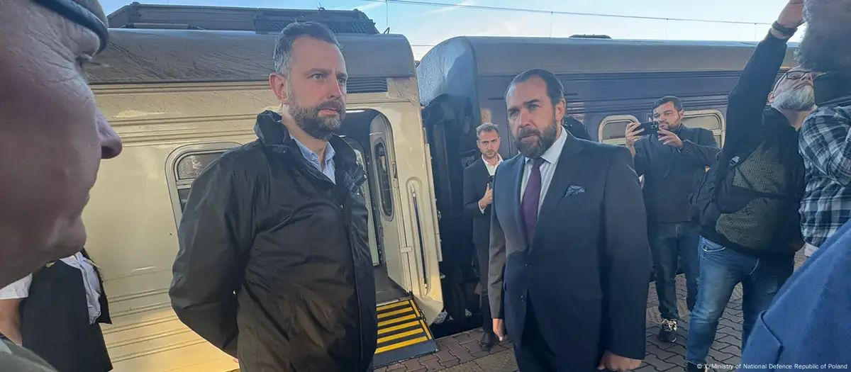 Polish Defence Minister Władysław Kosiniak-Kamysz (left) stands in Kyiv during an official visit, meeting Ukrainian officials to discuss defence cooperation and joint training against Russian drone threats.