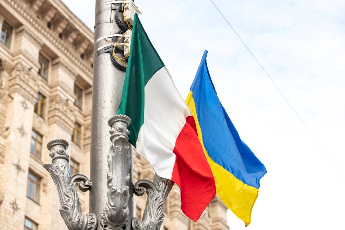 Ukrainian and Italian flags are depicted together