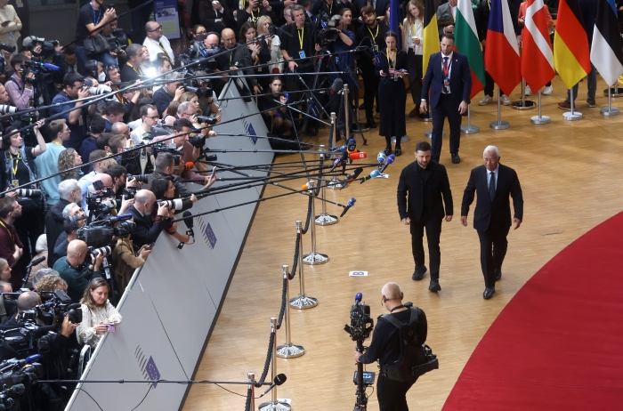 Ukrainian President Volodymyr Zelenskyy and President of the European Council António Costa are walking during European Council summit in Brussels