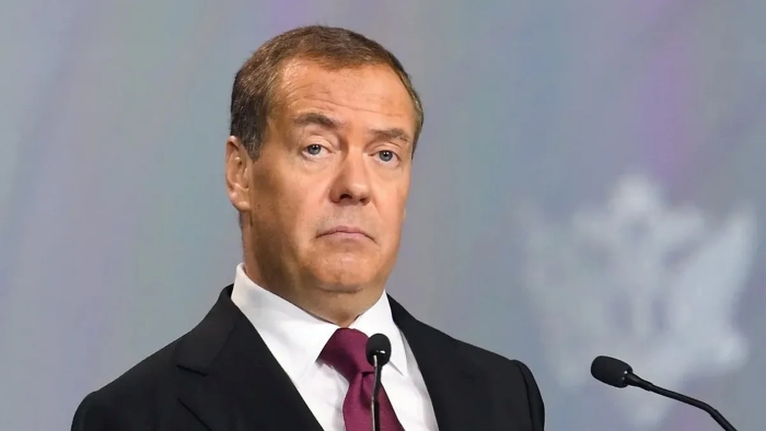 Dmitry Medvedev looking surprised in a portrait photo