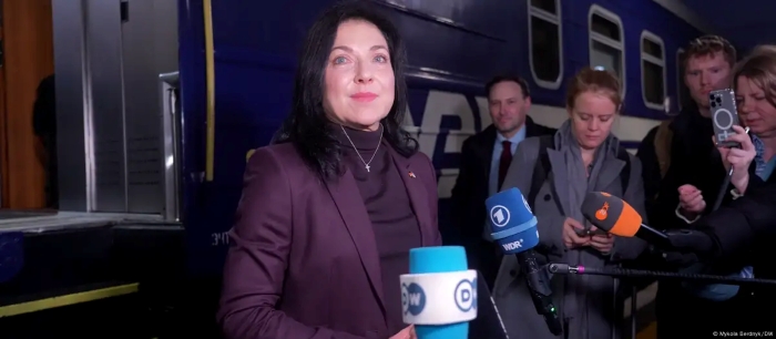 The picture portrays German Minister for Economic Affairs and Energy Katerina Reiche during her visit to Kyiv on the background of Ukrainian Railway