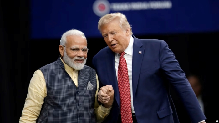 Prime Minister Narendra Modi and President Donald Trumpdepicted shaking hands during their meeting at NRG Stadium in Houston on 22 September 2019