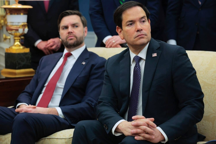 The picture shows Marco Rubio sitting together