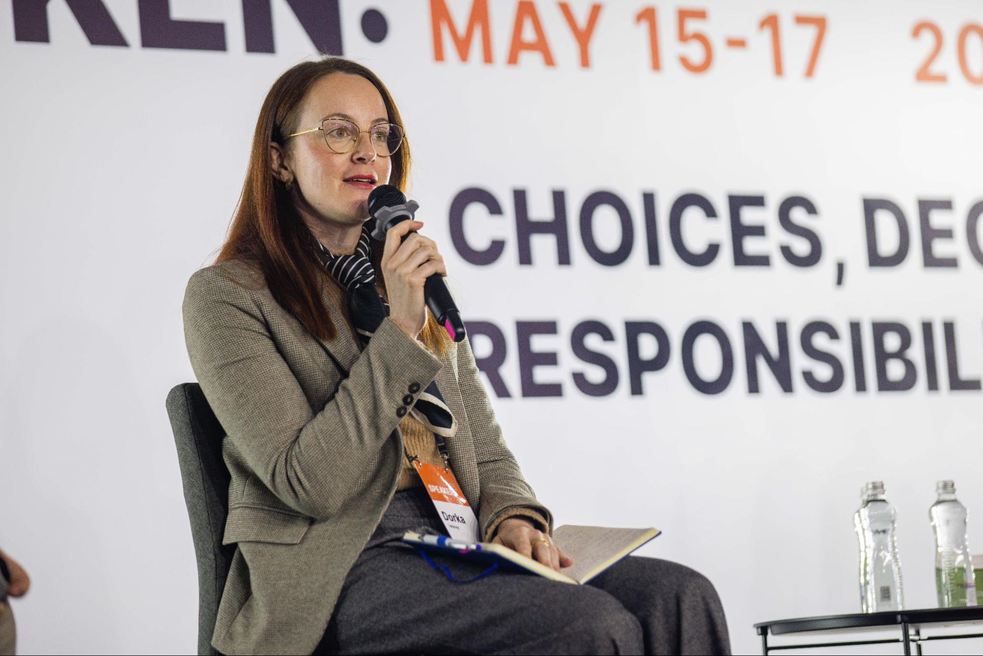 the picture portrays Dorka Takacsy, Researcher at the Center for Euro-Atlantic Integration and Democracy