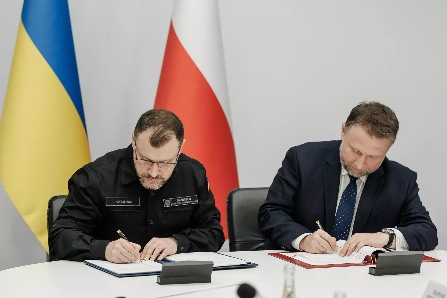 The Ministers of Internal Affairs of Ukraine and Poland sign the agreement, Dec, 2025 / Ministry of Internal Affairs of Ukraine