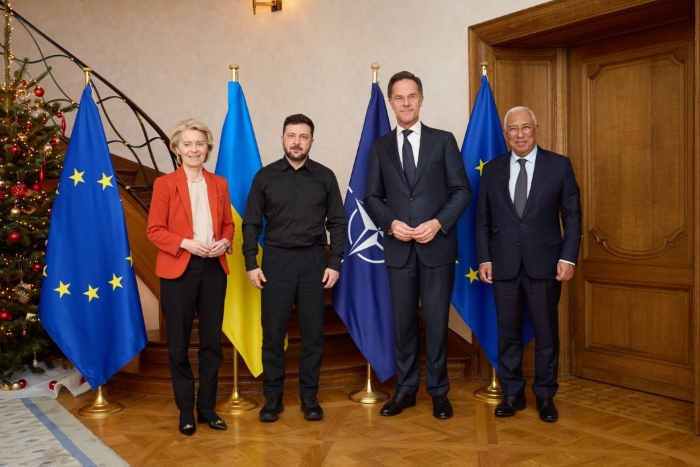 The picture portrays Ukraine`s President Volodymyr Zelenskyy, NATO Secretary General Mark Rutte, European Council President António Costa, and European Commission President Ursula von der Leyen during the meeting in Brussels on December 9 in front of Ukraine`s, EU, and NATO`s flags