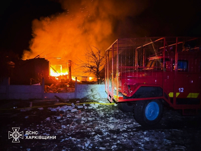 The picture shows fire caused by Russian attack and Emergency Service of Ukraine in Kharkiv Region work