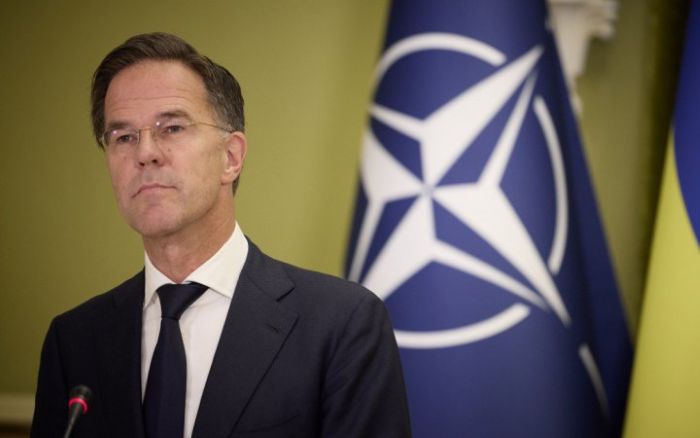 The picture portrays NATO Secretary General Mark Rutte