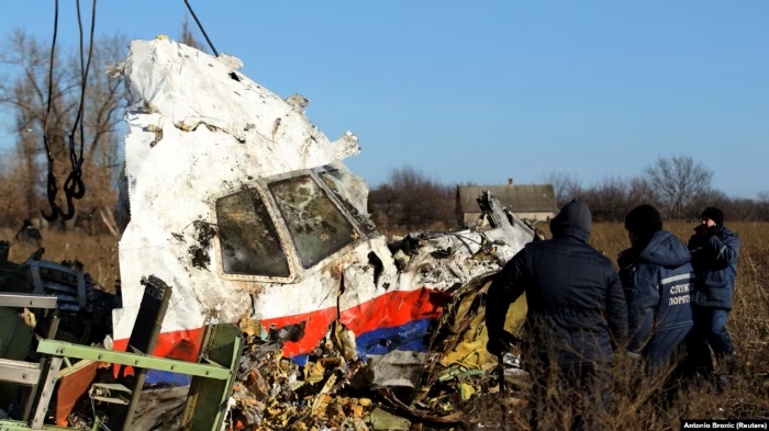 The pictures shows at the crash site of a Malaysian Boeing 777