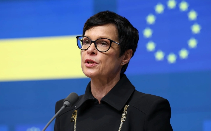 The picture portrays EU Enlargement Commissioner Marta Kos