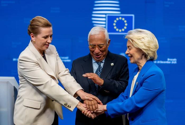 Danish Prime Minister Mette Frederiksen (left), European Council President António Costa and European Commission President Ursula von der Leyen announce the agreement at a summit in Brussels