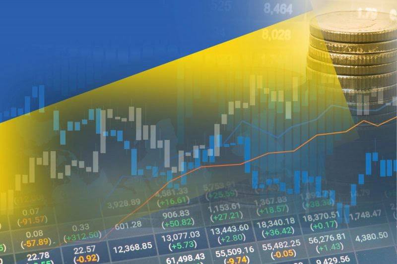 Illustrative photo combining the Ukrainian flag with financial data, graphs and a stack of coins