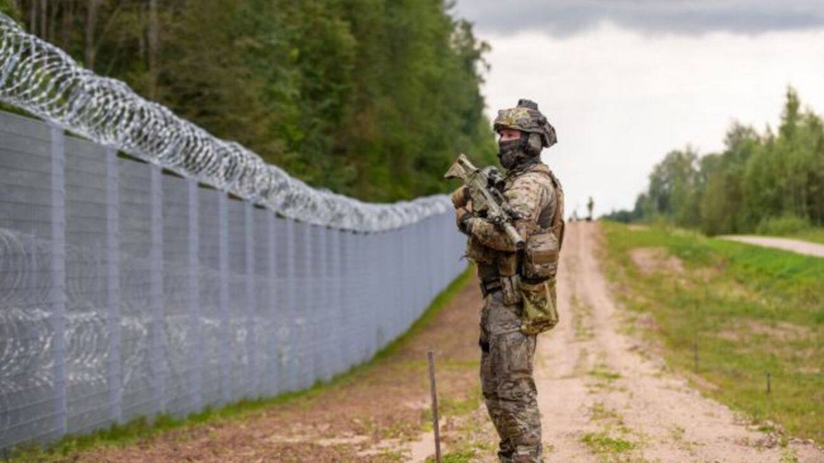 An illustrative view of the fortified border between Latvia and Belarus. Following the successful completion of a 145-kilometer fence along the Belarusian frontier to curb hybrid threats.