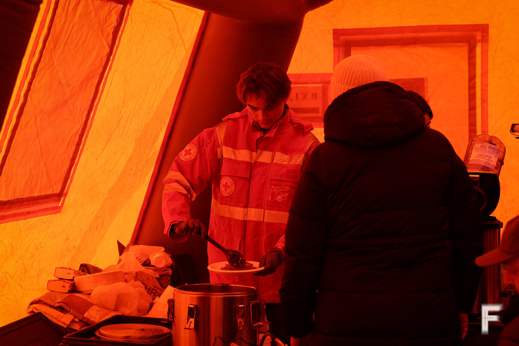 People being fed at a Resilience Hub in Kyiv