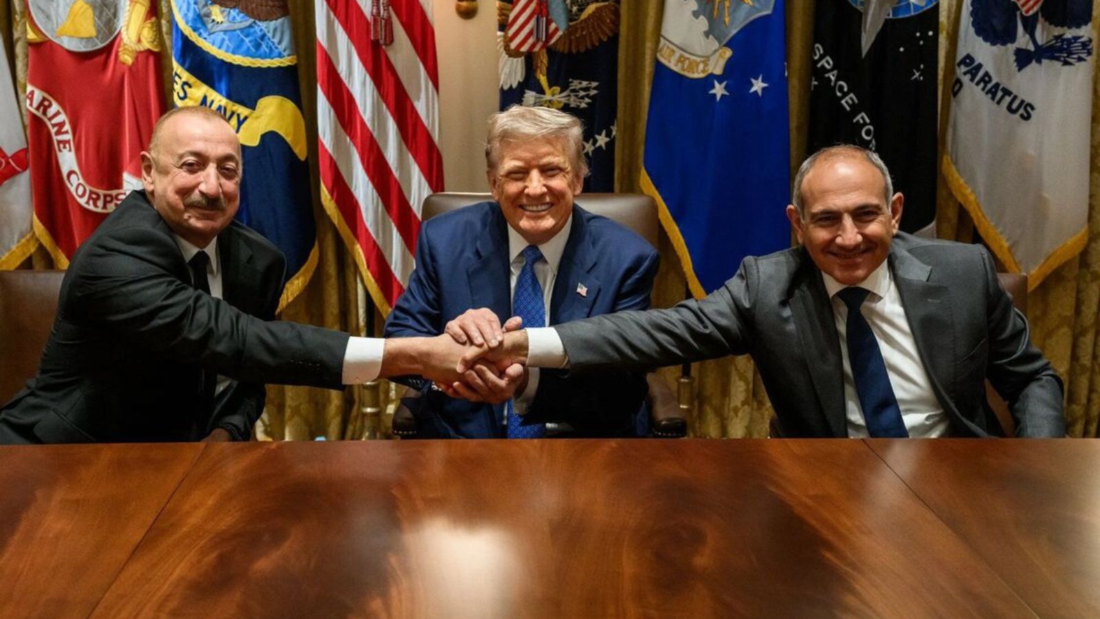 The Presidents of the US and Azerbaijan along with the Prime Minister of Armenia during an official meeting.
