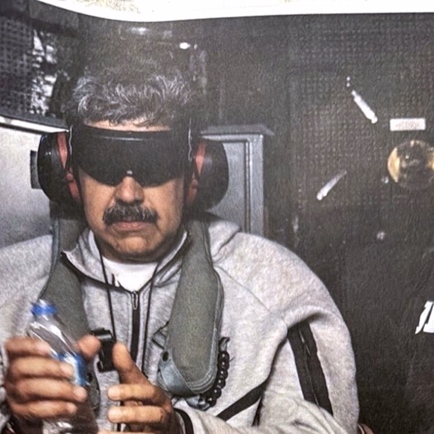 In this photo posted to social media by President Donald Trump, Venezuelan President Nicolas Maduro is shown in U.S. custody, on Jan. 3, 2026 / Donald Trump's X account
