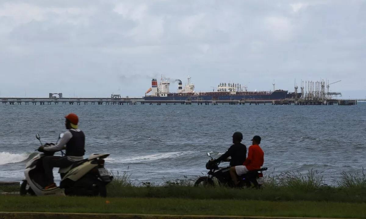 The sanctioned Guinea-flagged oil tanker MT Bandra is partially seen alongside another vessel at the El Palito terminal, near Puerto Cabello, Venezuela, December 29, 2025