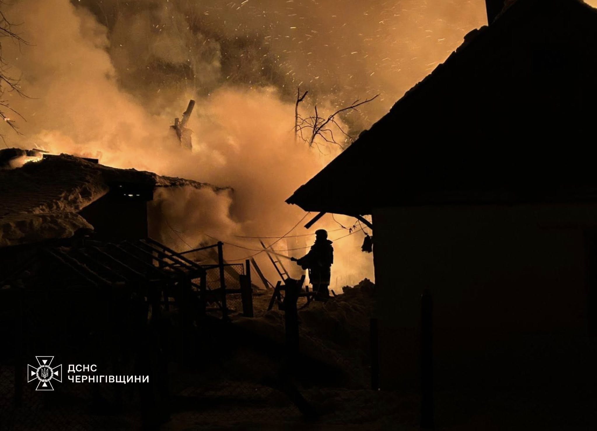 State Emergency Service workers extinguish a fire after a Russian drone strike