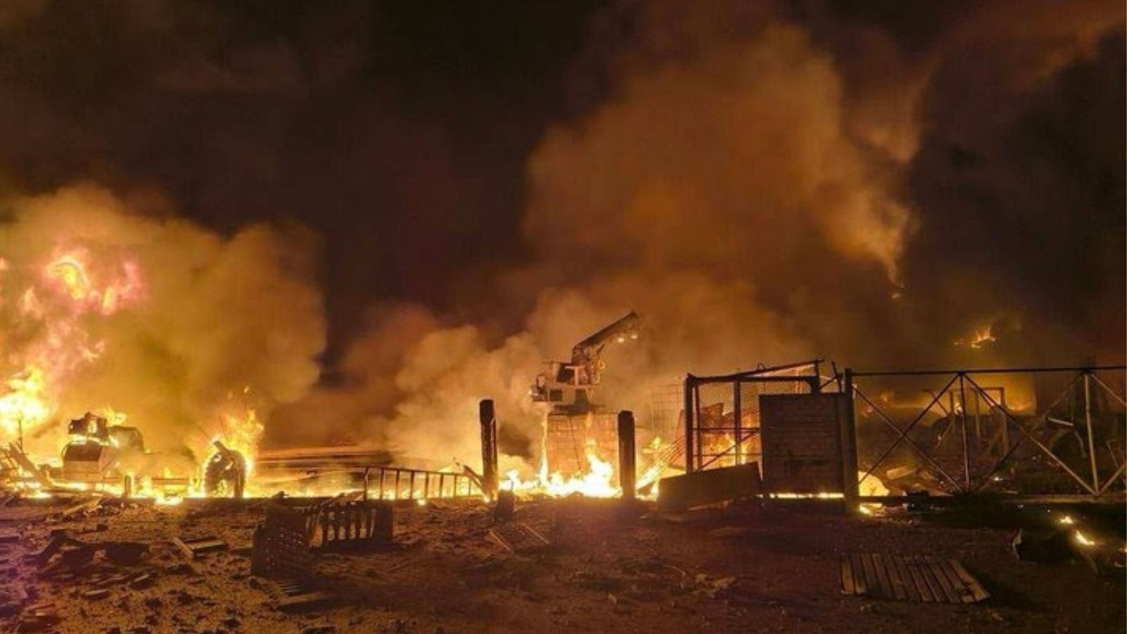 A large fire at a civilian site in Brovary at night following a Russian missile strike.