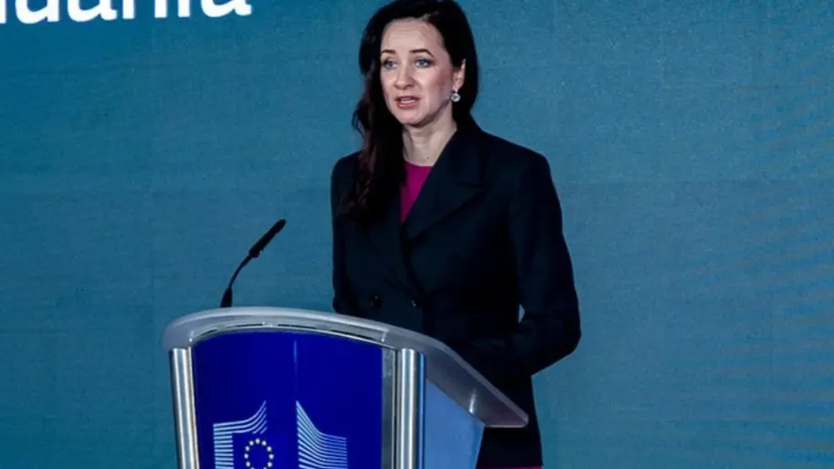 Inga Ruginienė speaks from the podium