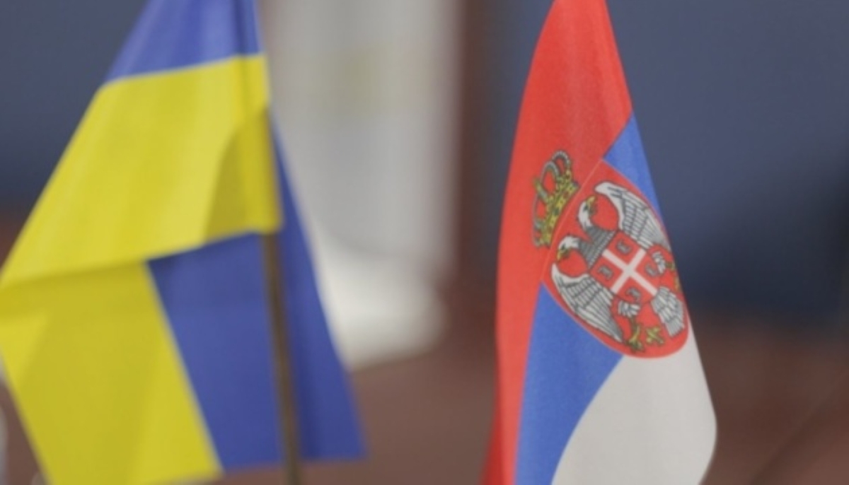 Ukraine`s and Serbia`s flags stand together
