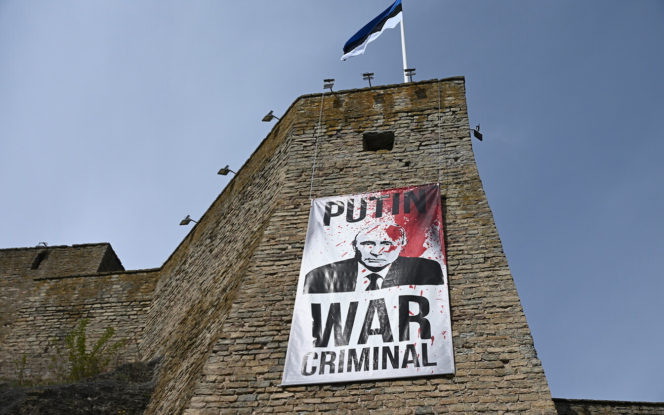 Banner in Estonia with the caption "Putin war criminal"