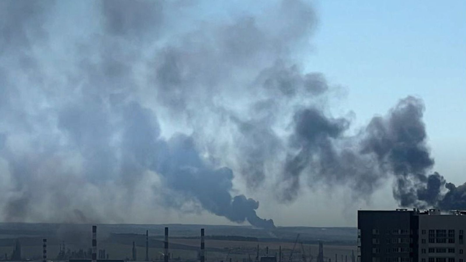 Thick black smoke rising above the Lukoil oil refinery in Perm after a successful strike on the facility.