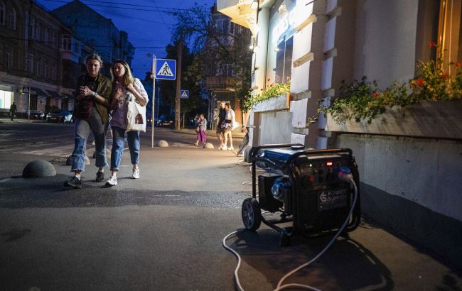 Generator is working in Ukraine in the evening during the blackout